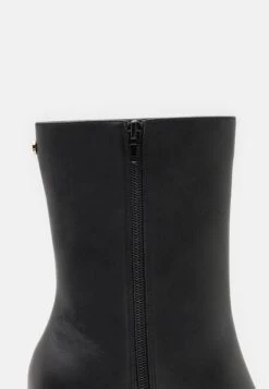 Buffalo May Zip Boot Mid Men - Classic Ankle Boots - Black -Fashion Shoe Store 265342254b5a4d7daecd110a6586d49c