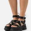 Buffalo Vegan Rude Up - Platform Sandals - Black -Fashion Shoe Store 550c6293e35247c6b204c7b539ec0ccd
