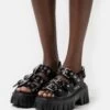 Buffalo Vegan Lion Hard - Platform Sandals - Black -Fashion Shoe Store 9d8431491d28429aba5bcb824ca8154e