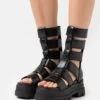 Buffalo Vegan Aspha Zeus - Platform Sandals - Black 1 Buffalo Vegan Aspha Zeus - Platform Sandals - Black -Fashion Shoe Store b80efd2c3f904f4e81d243f24d741560