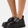 Buffalo Aspha Monk - Slip-Ons - Black -Fashion Shoe Store bdf9f1f153e549c6a22acfec46934376
